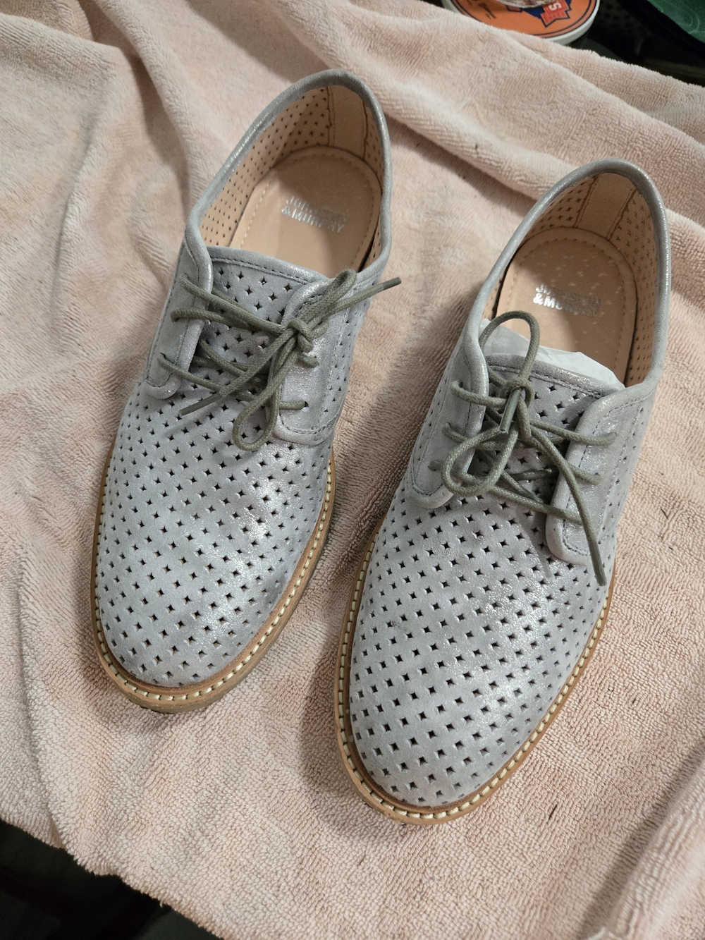 Johnston & Murphy silver perforated leather oxford shoes feature a metallic